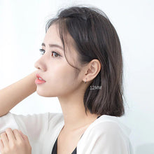 Laden Sie das Bild in den Galerie-Viewer, Runde Ohrringe aus Silber